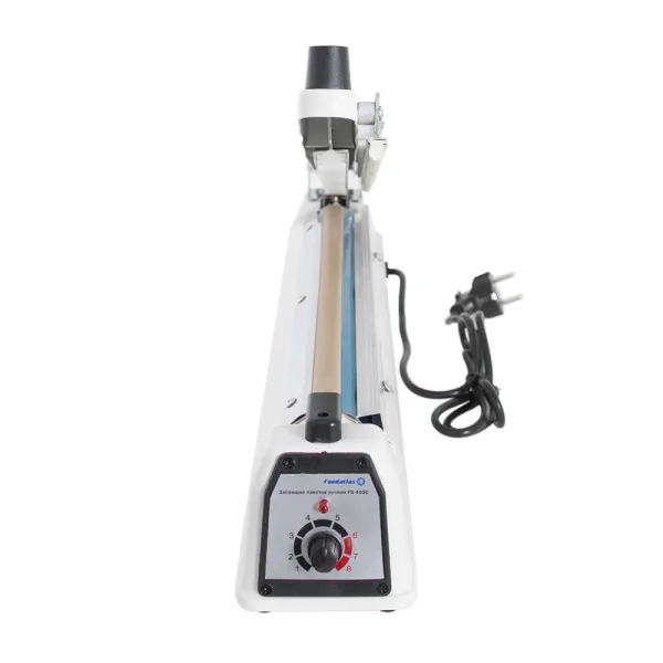 Запайщик пакетов Foodatlas FS-400C нож сбоку  Запайщик пакетов Foodatlas FS-400C нож сбоку